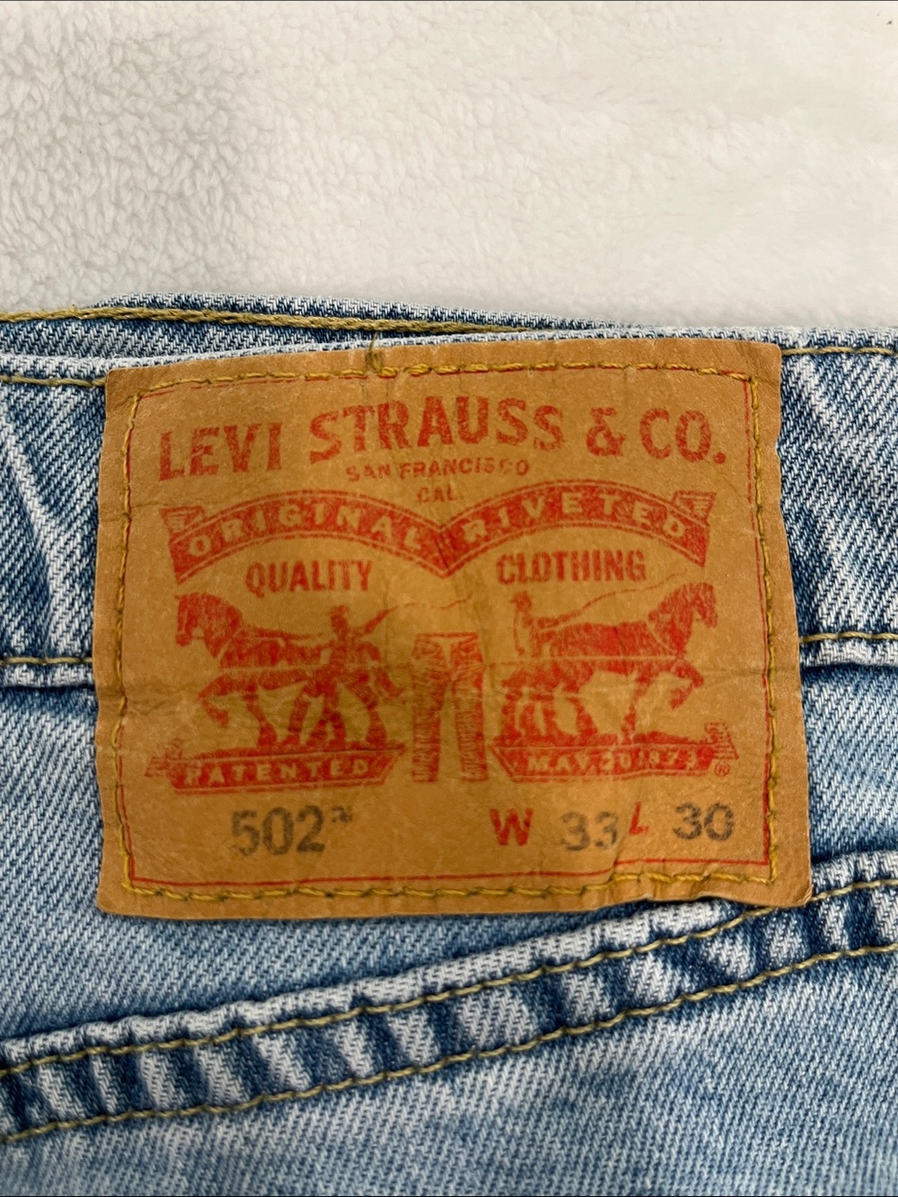 Levi's Men's 502 Relaxed Jeans in Light Blue Denim